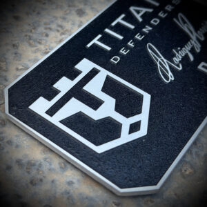 Stainless Steel Badge - Titan Defenders